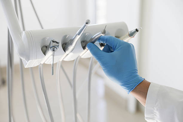 Professional Invisalign Clear Aligners technician working in Robbins, NC